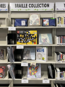 Library display for the new Braille collection. Includes, but not limited to: picture books, board books, and cards.