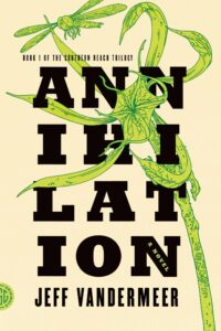Cover of Annihilation by Jeff VanderMeer. Text is on a beige background, and is broken up into ANN - IHI - LAT - ION, all on different lines, half seen behind a green plant.